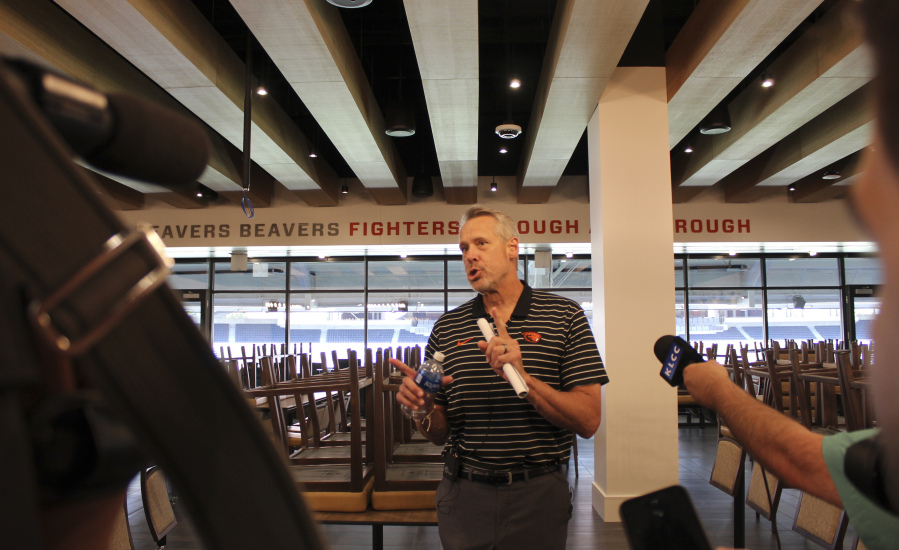 Oregon State athletic director Scott Barnes speaks inside one of the premium spaces inside renovated Reser Stadium on Tuesday, Aug. 8, 2023, in Corvallis, Ore. Oregon State is looking for stability for its teams after the college sports realignment that has destabilized the Pac-12.