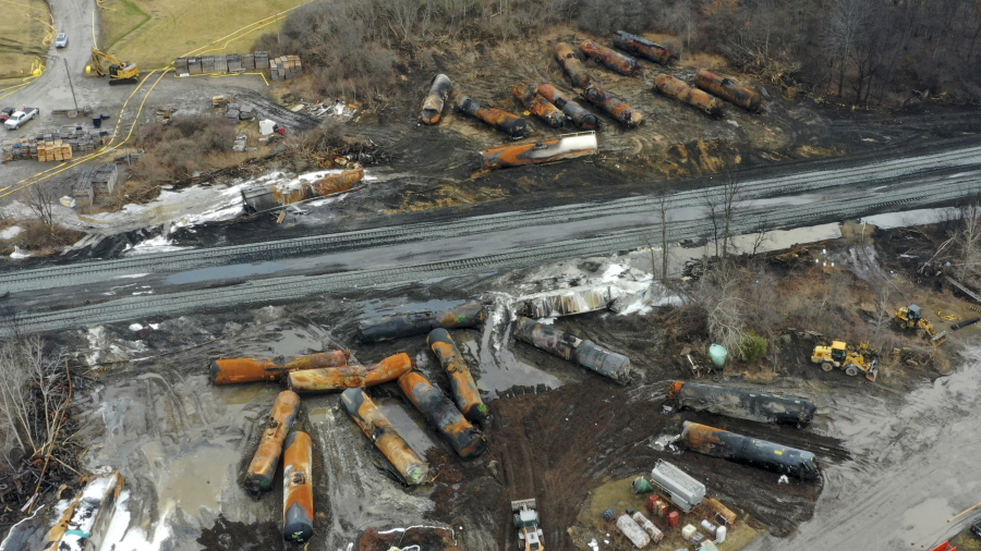 FILE - Cleanup of portions of a Norfolk Southern freight train that derailed Friday night in East Palestine, Ohio, continues on Feb. 9, 2023. (AP Photo/Gene J.