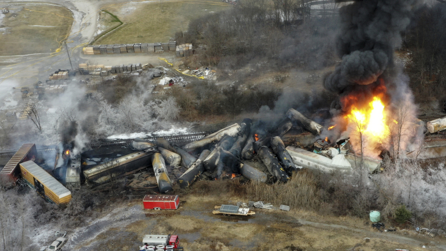 FILE - This photo taken with a drone shows portions of a Norfolk and Southern freight train that derailed the night before in East Palestine, Ohio, on Feb. 4, 2023. (AP Photo/Gene J.