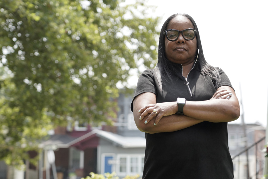 Philadelphia public school teacher Rhonda Hicks, shown July 20 outside her home in Philadelphia, loves teaching and loves her students, but other aspects of the job have deteriorated. When she retires soon, she will join a disproportionately high number of Black and Hispanic teachers in Pennsylvania who are leaving the profession.
