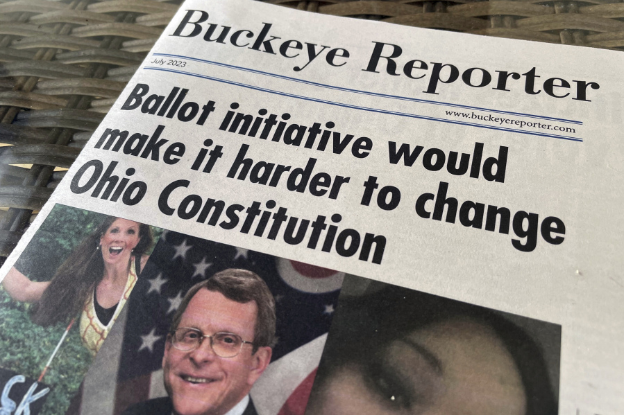 A fake newspaper titled "The Buckeye Reporter" is shown Aug. 4, 2023, in Columbus, Ohio. Ohio residents in recent weeks received the fake newspaper touting misleading claims about Ohio politics, advocacy groups and the upcoming Aug 8, 2023 election on Issue 1 - a ballot measure that would make it harder to amend the state's constitution. The publication is one of thousands of pseudo-local news outlets created by the Illinois-based Metric Media or Pipeline Media, known for often producing false content with a conservative political agenda.