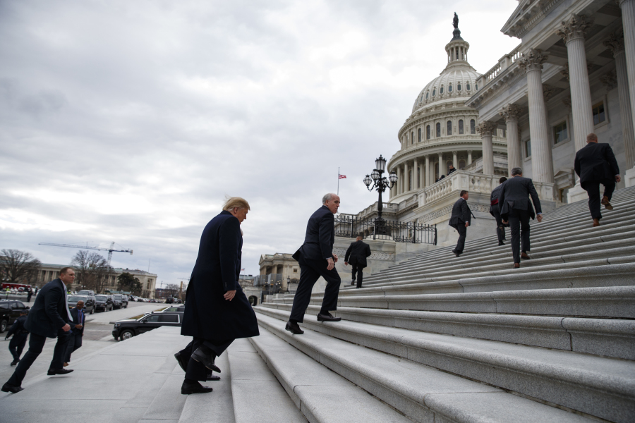 FILE - President Donald Trump arrives on Capitol Hill for a Senate Republican policy lunch, Jan. 9, 2019, in Washington.