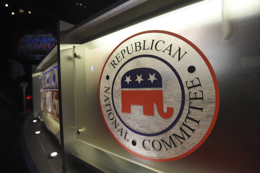 FILE - The Republican National Committee logo is shown on the stage as crew members work at the North Charleston Coliseum, Jan. 13, 2016, in North Charleston, S.C. With less than a month to go until the first 2024 Republican presidential debate, seven candidates say they have met the qualifications for a podium slot. But that also means that about half of the broad GOP field is running short on time to make the stage.