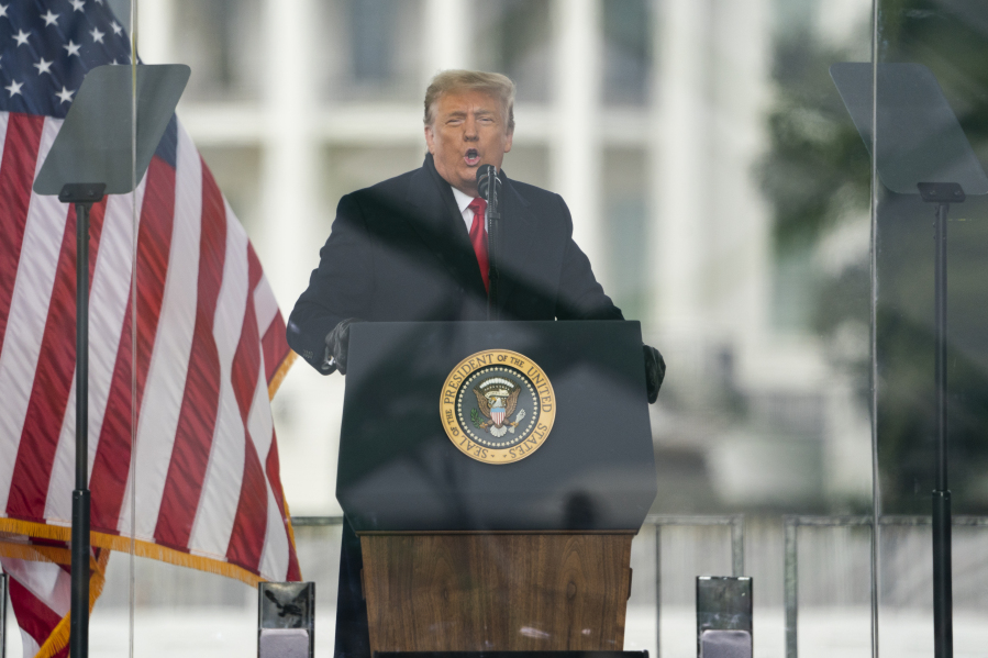 FILE - President Donald Trump speaks during a rally protesting the electoral college certification of Joe Biden as President in Washington, Jan. 6, 2021. Liberal groups are trying to end Donald Trump's attempt to return to the White House by arguing that he is no longer eligible to be president after trying to overturn the 2020 election results.