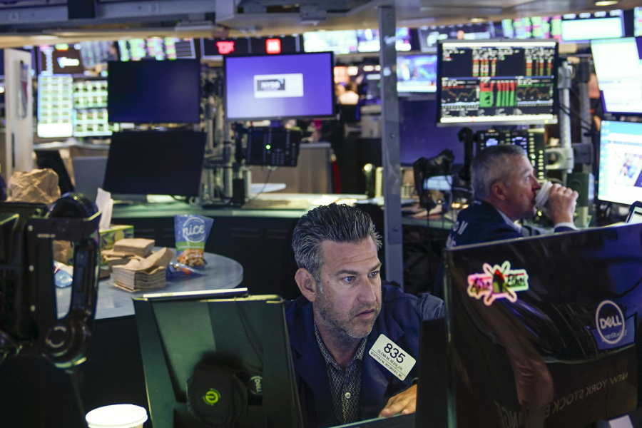 Traders work on the floor at the New York Stock Exchange in New York, Wednesday, July 26, 2023. Stocks are opening mixed as Wall Street waits to hear what the Federal Reserve will do with interest rates later in the afternoon.