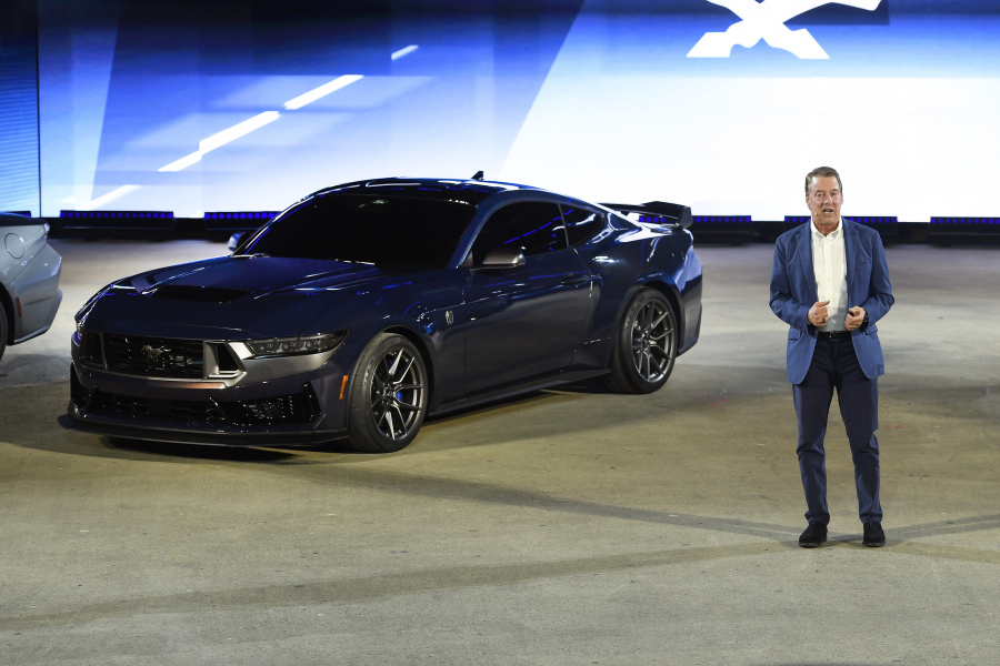 Bill Ford, executive chairman of Ford, introduces one of the models of the 2024 Ford Mustang, the performance vehicle Dark Horse, at the North American International Auto Show on Sept. 14 in Detroit.