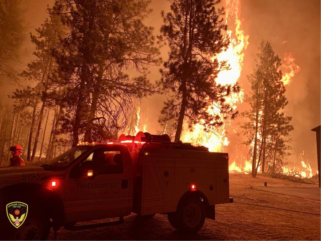The Gray Fire burns near Spokane on Monday.
