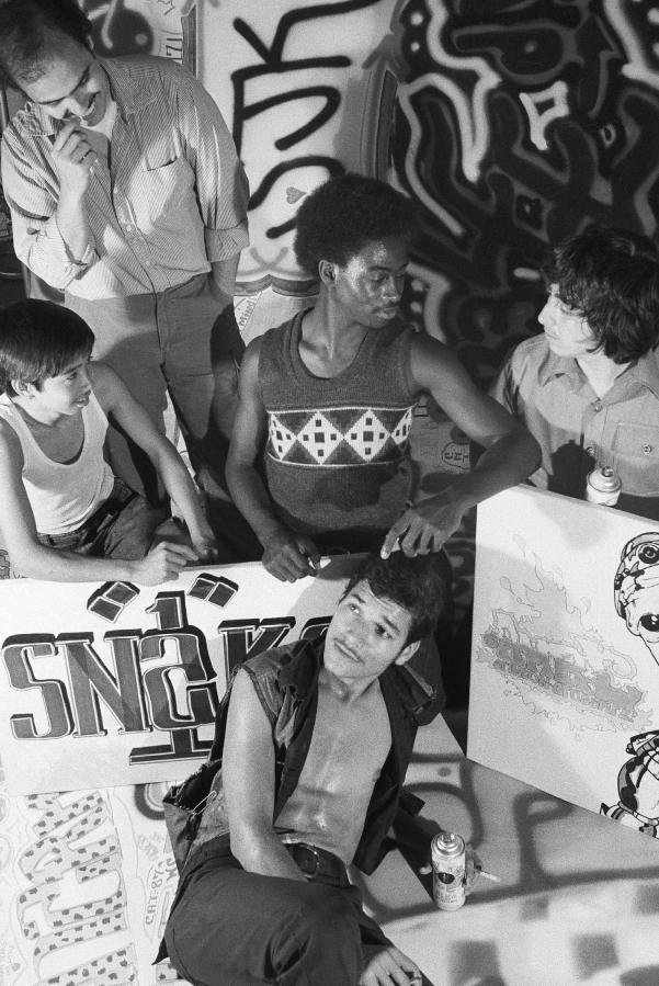 Members of the United Graffiti artists exchange notes on their latest creations in their Manhattan studio on Aug. 24, 1973. The group was founded by college student Hugo Martneez, left rear, after New York City became inundated with an outbreak of Graffiti on buses, subways and buildings. In the five decades since hip-hop emerged out of New York City, it has spread around the country and the world. And at each step there's been change and adaptation, as new, different voices came in and made it their own. Its foundations are steeped in the Black communities where it first made itself known but it's spread out until there's no corner of the world that hasn't been touched by it.