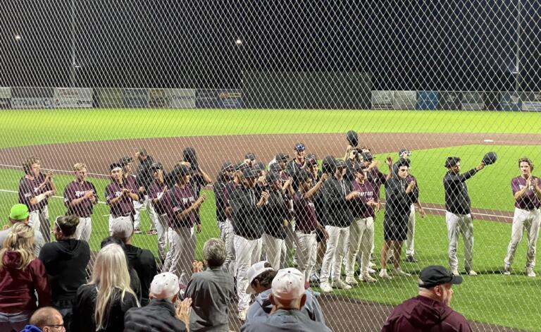 Ridgefield Raptors players give thanks to fans following a 10-6, season-ending loss to the Portland Pickles in the West Coast League Divisional playoffs on Wednesday, Aug. 9, 2023, at Ridgefield Outdoor Recreation Complex.