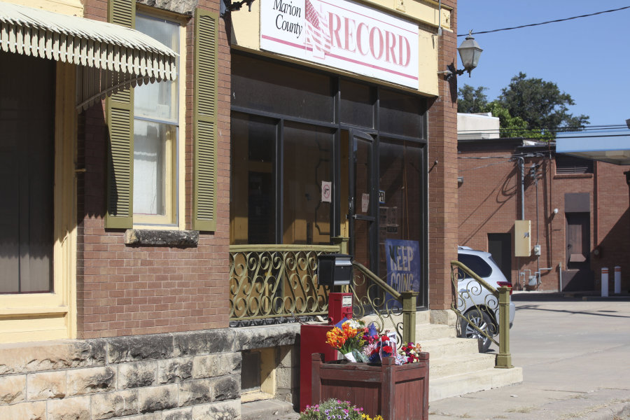 The offices of the Marion County Record await the arrival of copies of its latest weekly edition, Wednesday, Aug. 16, 2023, in Marion, Kan. The paper found its work on that edition hindered because of raid on its offices and the home of its publisher on Aug. 11, 2023, by local police.
