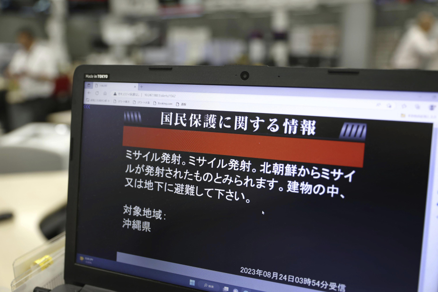 A monitor in Tokyo shows J-Alert or National Early Warning System to the residents in Okinawa, southern Japan, Thursday, Aug. 24, 2023. North Korea said Thursday that its second attempt to launch a spy satellite failed again but vowed to make another attempt in October, demonstrating willingness to endure flops to acquire a key military asset coveted by leader Kim Jong Un. The failed launch prompted neighboring Japan to issue brief a "J-alert" ordering some residents to evacuate to safe places as the North Korean rocket flew over its southernmost islands of Okinawa to the Pacific Ocean. The screen reads " Missile launched, Missile launched. It seems missile was launched from North Korea. Please take shelter inside buildings or underground.