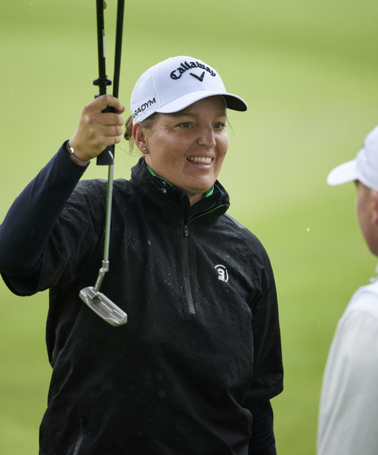 Perrine Delacour, of France, smiles while walking off the 18th hole during the first round of the LPGA Portland Classic golf tournament in Portland, Ore., Thursday, Aug. 31, 2023.