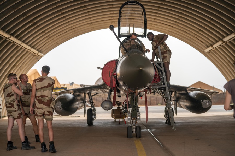 FILE - French Barkhane Air Force mechanics maintain a Mirage 2000 on the Niamey, Niger base, on June 5, 2021. On Thursday, Aug. 3, 2023, night, the junta said on state television it was terminating the military agreements and protocols signed with it's former colonial ruler, France.