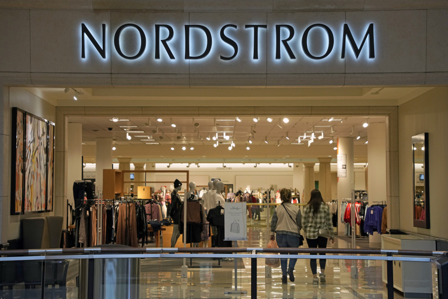 FILE - This photo shows the entrance to a Nordstrom store, Jan. 30, 2023, in Pittsburgh. On Thursday, Aug. 24, Nordstrom reported that its sales and profits fell in its fiscal second quarter, joining its department store peers coping with shoppers' cautious spending. (AP Photo/Gene J.