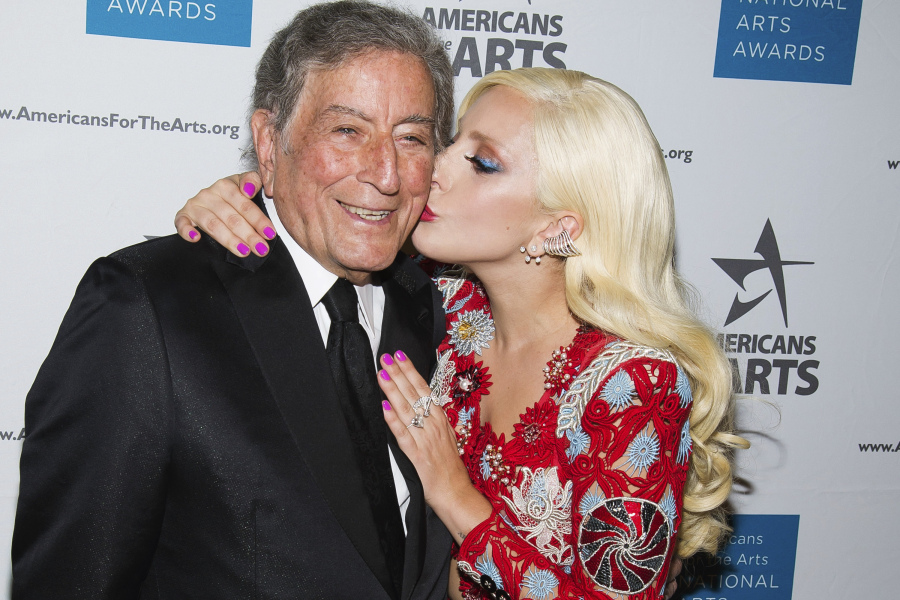 Tony Bennett, left, and Lady Gaga appear at the Americans for the Arts 2015 National Arts Awards in New York on Oct. 19, 2015. Bennett died Friday, July 21 at age 96.