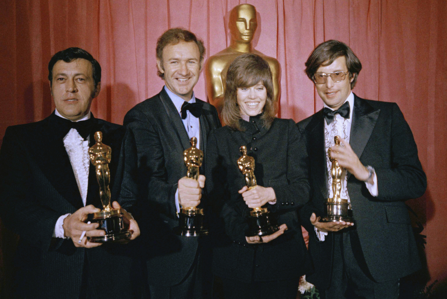 FILE - William Friedkin, winner of the award for best achievement in directing for "The French Connection," from right, Jane Fonda, winner of the best actress award for "Klute," Gene Hackman, winner of the best actor award for "The French Connection" and producer Philip D'Antoni, winner of the award for best picture for "The French Connection," pose in the press room at the Academy Awards, March 27, 1971  in Los Angeles. Friedkin died Monday, Aug. 7, 2023, in Los Angeles, his wife, producer and former studio head Sherry Lansing told The Hollywood Reporter.