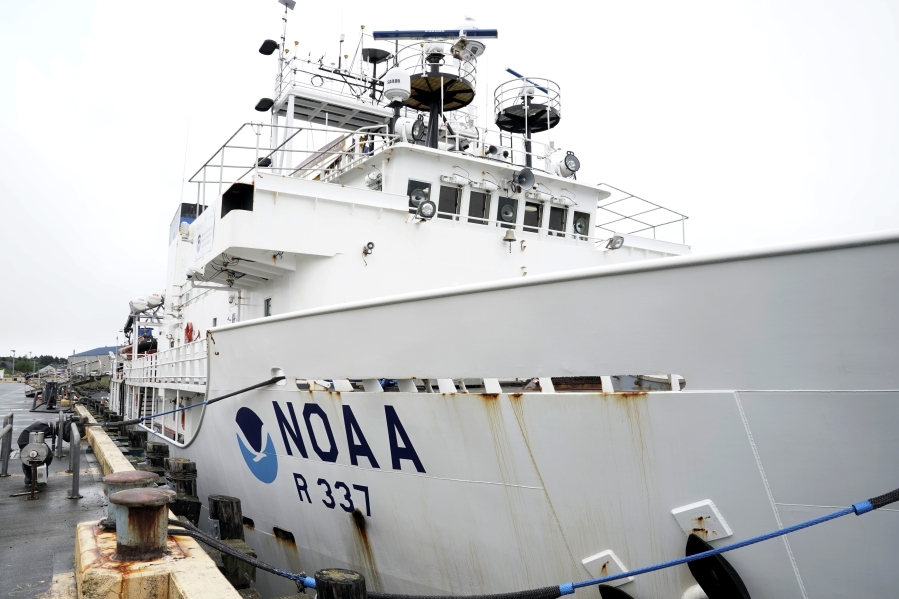 The NOAA Okeanos Explorer sits at a dock on Friday, June 23, 2023, in Kodiak, Alaska. The ship, a reconfigured former U.S. Navy vessel run by civilians and members of the NOAA Corps, is specially outfitted with technology and tools needed to access deep into the ocean, and to share that data with the public and on-shore researchers in real-time. (AP Photo/Joshua A.