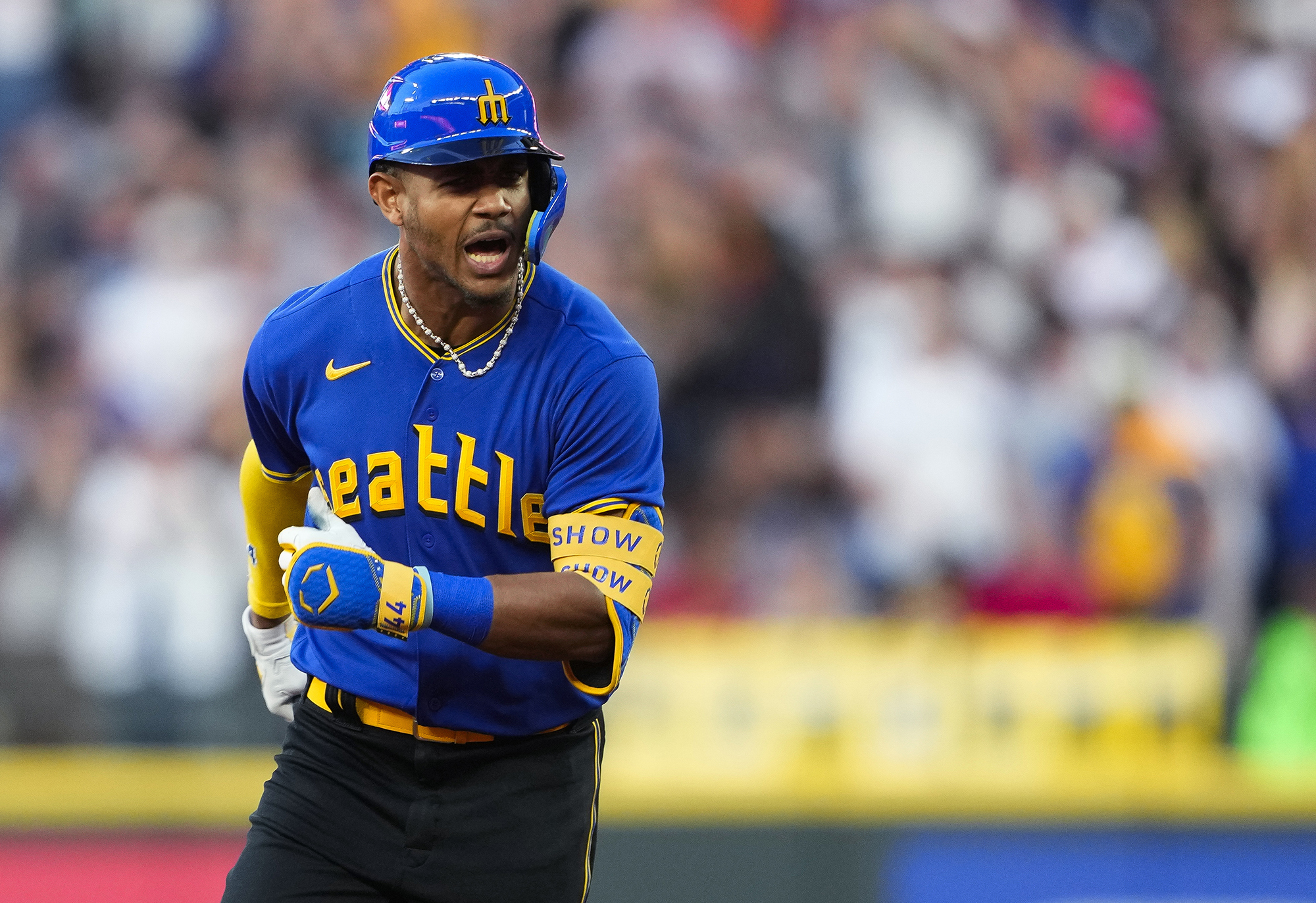 Seattle Mariners' Julio Rodríguez yells as he runs the bases on a three-run home run against the Baltimore Orioles during the fourth inning of a baseball game Friday, Aug. 11, 2023, in Seattle.