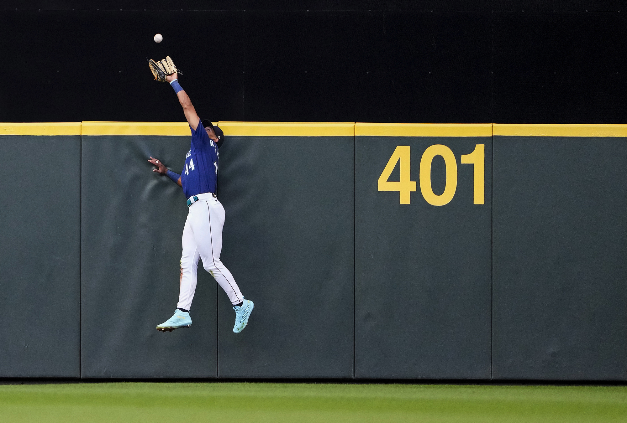 Seattle Mariners center fielder Julio Rodriguez catches a fly ball from San Diego Padres' Fernando Tatis Jr. during the fourth inning of a baseball game Tuesday, Aug. 8, 2023, in Seattle.