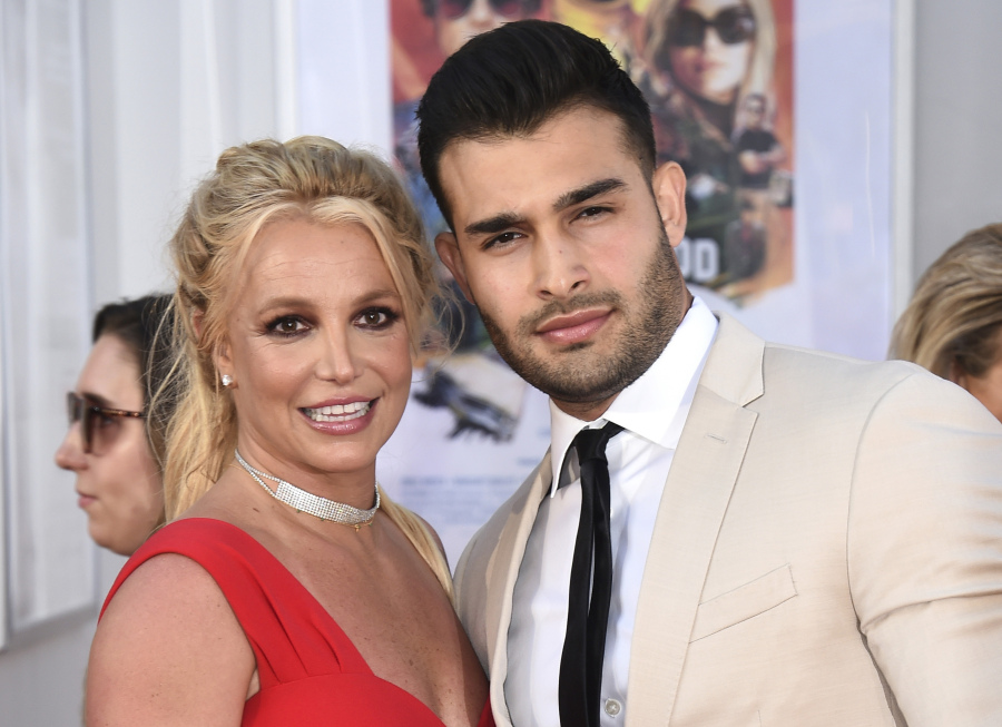 FILE - Britney Spears and Sam Asghari appear at the Los Angeles premiere of "Once Upon a Time in Hollywood" on July 22, 2019. Asghari has filed for divorce from Spears, a person familiar with the filing said late Wednesday, Aug. 16, 2023. The person, who is close to Asghari but not authorized to speak publicly, confirmed the filing happened Wednesday, hours after several outlets including TMZ and People magazine reported the couple had separated.