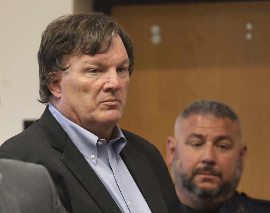 Rex A. Heuermann, the architect accused of murdering at least three women near Long Island's Gilgo Beach, appears before Judge Timothy P. Mazzei in Suffolk County Court, Tuesday, Aug. 1, 2023, in Riverhead, N.Y.