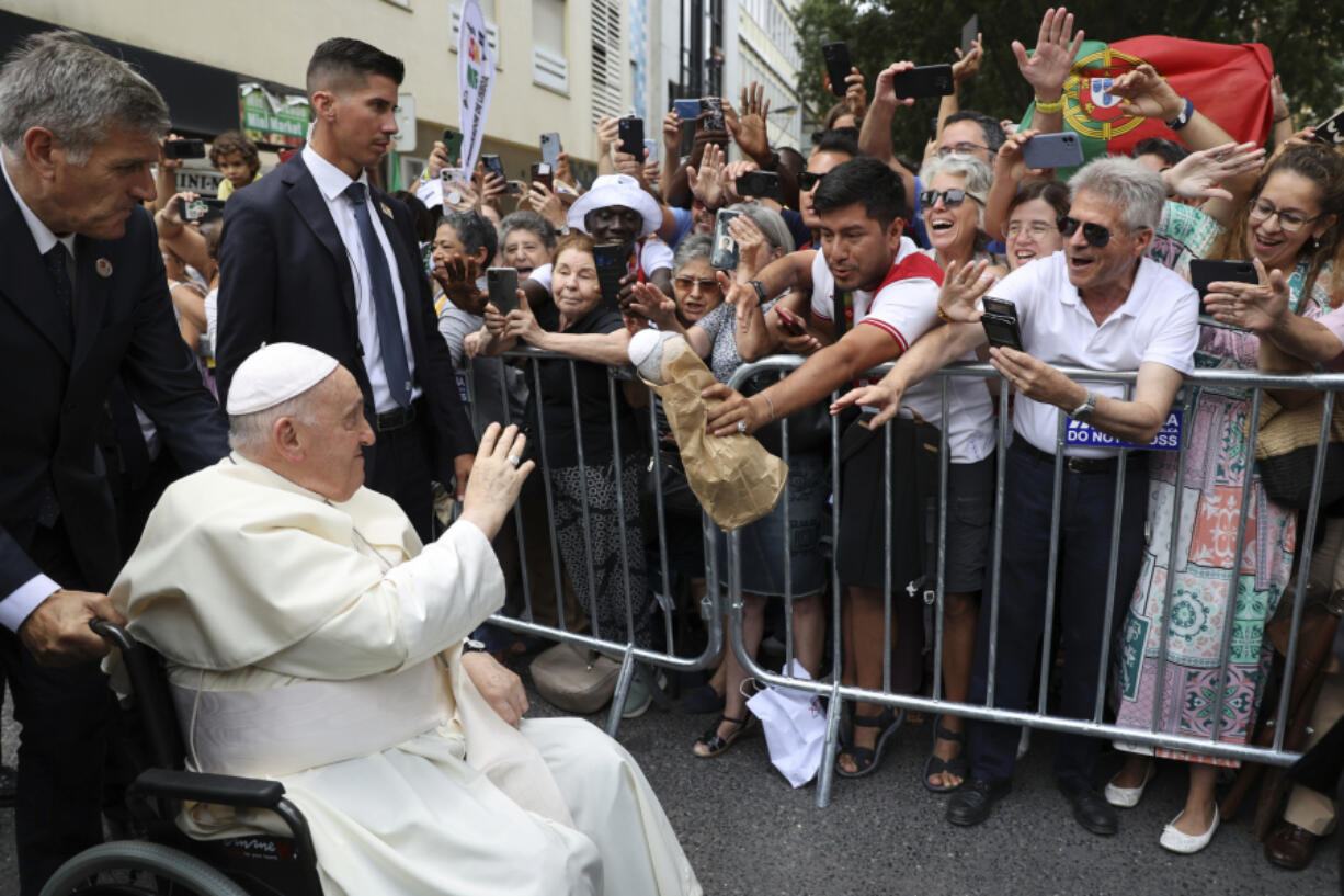 Pope Francis urges Europe to work for peace as he lands in Portugal for