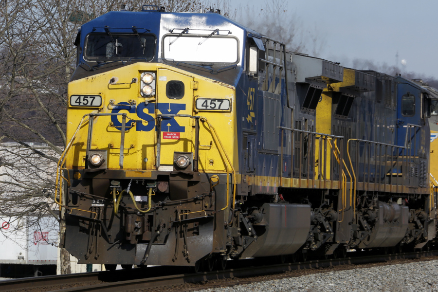 FILE - A CSX freight train passes through Homestead, Pa., Feb. 12, 2018. The nation's largest railroad union wants federal regulators to do more to ensure conductors are properly trained in the wake of two recent trainee deaths, according to a statement issued Wednesday, Aug. 23, 2023. The union said the recent deaths of two CSX trainees on different occasions in Maryland over the past two months highlight the need for better training. (AP Photo/Gene J.