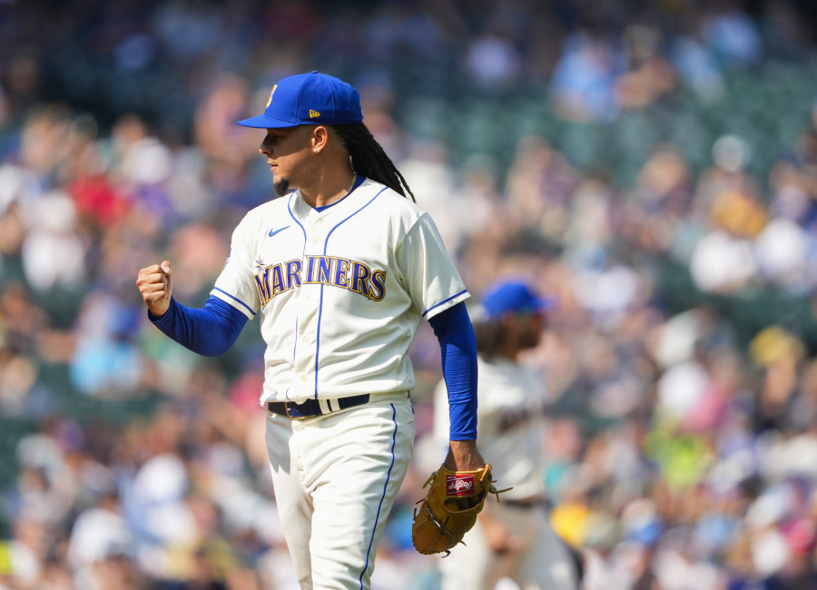 Seattle Mariners starting pitcher Luis Castillo walks off the field after pitching through the seventh inning of a baseball game against the Kansas City Royals, Sunday, Aug. 27, 2023, in Seattle.