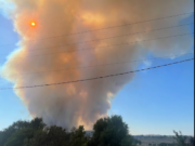 A plume of smoke rises from the Gray Fire, which forced evacuation of the city of Medical Lake and closed Interstate 90 west of Spokane.