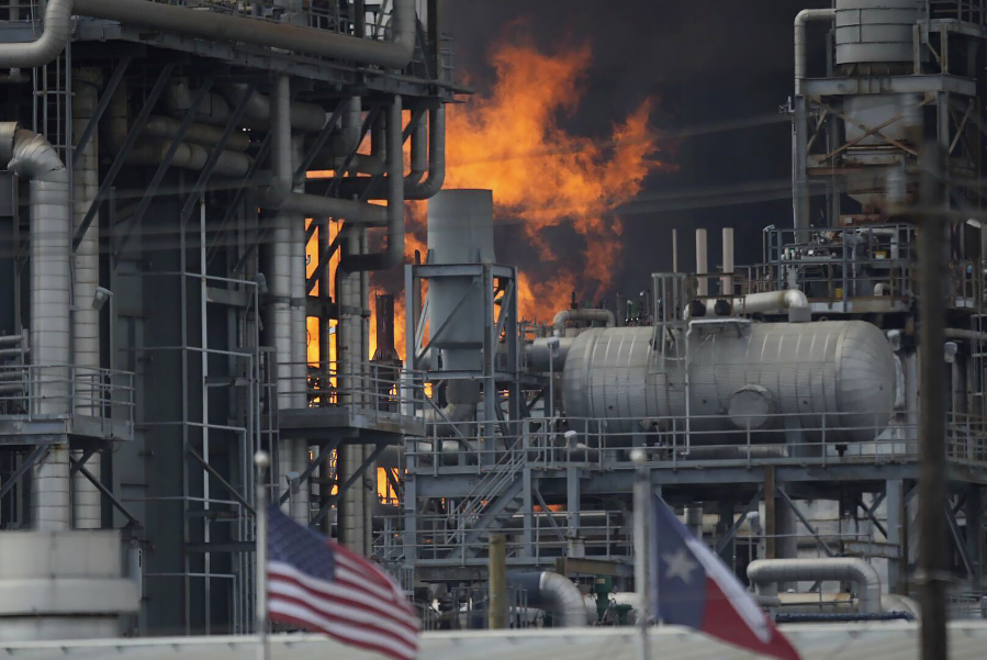 FILE - A fire burns at a Shell chemical facility in Deer Park, Friday, May 5, 2023 east of Houston.  Texas is suing Shell and is seeking more than $1 million, alleging a fire at the oil giant's Houston-area petrochemical plant damaged the environment.  The lawsuit, filed Aug. 7, 2023  in Travis County by the Texas attorney general's office, alleges air and water contamination and violations of state laws at the plant, including those of the Clean Air Act, the Solid Waste Disposal Act and the Water Code.