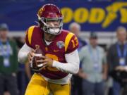 FILE - Southern California quarterback Caleb Williams (13) looks to pass during the first half of the Cotton Bowl NCAA college football game against Tulane, Monday, Jan. 2, 2023, in Arlington, Texas. USC opens their season at home against San Jose State on Aug. 26.