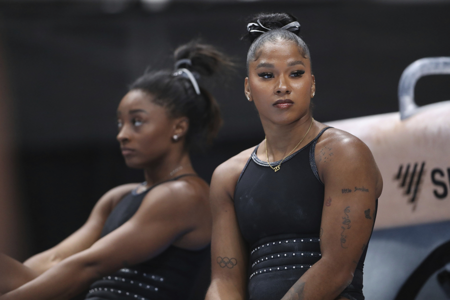 Jordan Chiles, right, and Simone Biles react during 2023 Xfinity U.S. Gymnastics Championships' training at SAP Center in San Jose, Calif., on Wednesday, Aug.