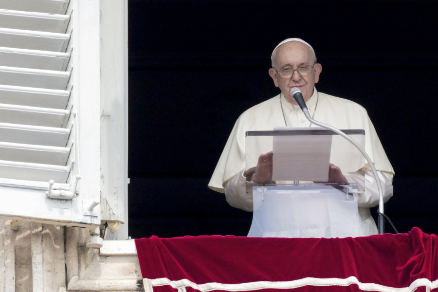 Pope Francis delivers his speech as he recites the Angelus noon prayer from the window of his studio overlooking St.Peter's Square, at the Vatican, Sunday, Aug. 27, 2023.