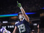 Seattle Seahawks wide receiver Jake Bobo celebrates after scoring against the Minnesota Vikings during the second half of an NFL preseason football game in Seattle, Thursday, Aug. 10, 2023.