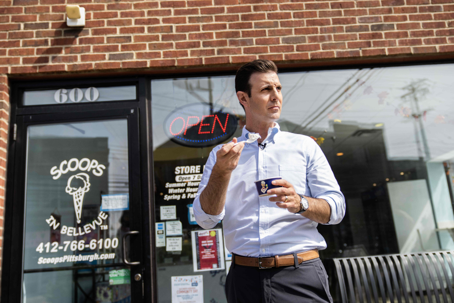 Chris Deluzio, D-Pa., gets ice cream at Scoops in Bellevue, Pennsylvania, on Tuesday, Aug. 29, 2023. Deluzio visited businesses in Bellevue after conducting a news conference on junk fees.