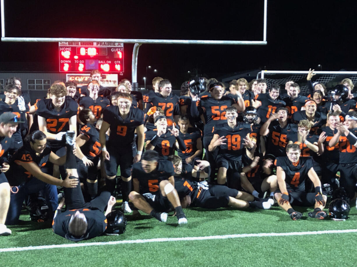 The Battle Ground football team poses for photos after a 42-7 win over Prairie on Friday, Sept. 15, 2023 at District Stadium in Battle Ground.