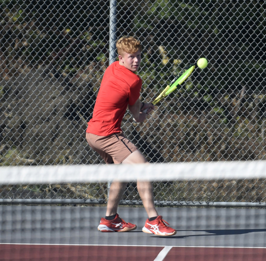 Tommy James of Camas hits a shot in a singles match against Aiden Bucerzan of Skyview at Camas High School on Monday, Sept. 18, 2023.