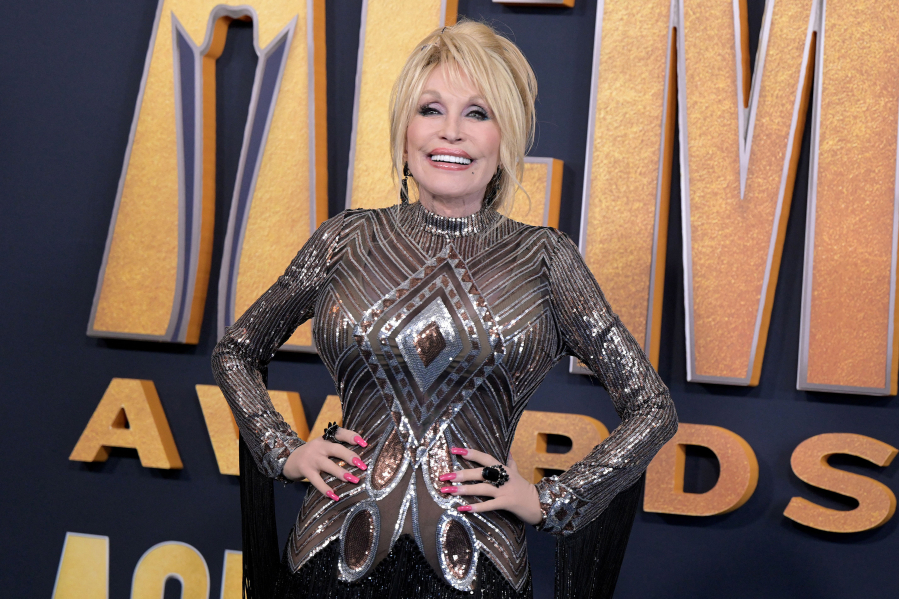 Dolly Parton arrives for the 57th Academy of Country Music awards on March 7, 2022, in Las Vegas.