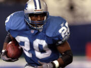 Detroit Lions running back Barry Sanders in action against the Pittsburgh Steelers at the Pontiac Silverdome on Nov. 26, 1998, in Pontiac, Mich.