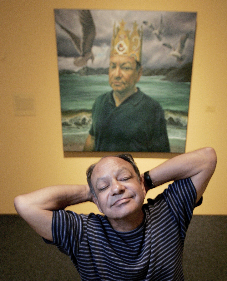 Cheech Marin poses with a likeness of himself, "It's A Brown World After All, 2006" by Eloy Torrez, on June 13, 2008.