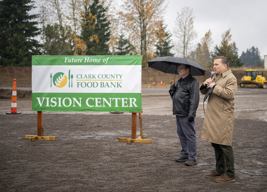 Clark County Food Bank President Alan Hamilton, right, and Board Chair Elson Strahan deliver speeches during a ground-breaking ceremony for the new Vision Center. Construction has been underway for since last fall.