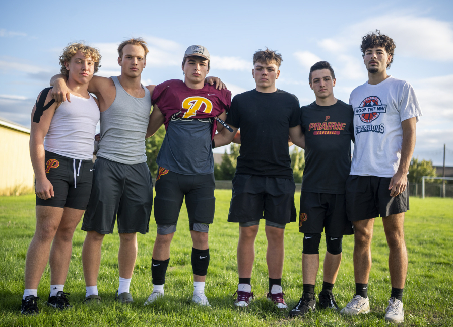 Prairie seniors Pierson Lameh, from left, Seth Blick, Mason Frei, Gage Bruno, Tyler McNulty and, Alex Juhl stand for a portrait Wednesday, Sept. 6, 2023, at Prairie High School. The crew of linebackers have been instrumental in the Falcons' switch to a 3-4 defense under head coach Will Ephraim.