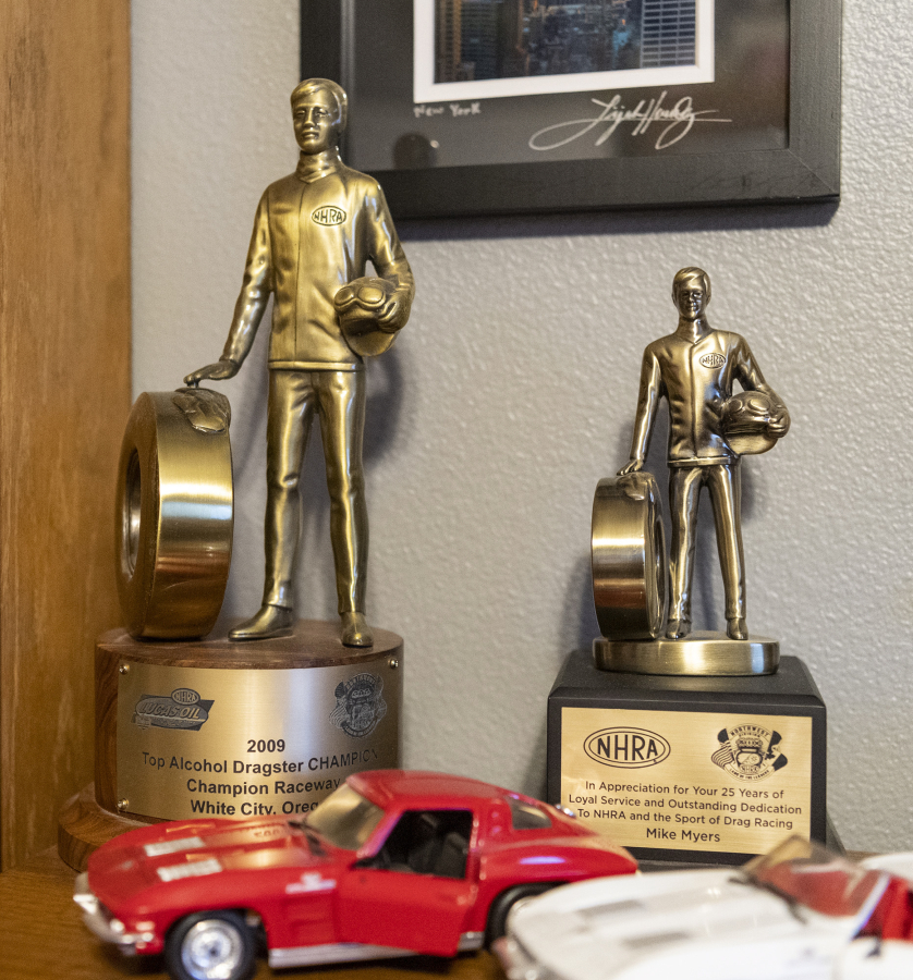 Drag racing trophies -- called "Wallys" because they feature the late founder of the National Hot Rod Association, Wally Parks -- sit in Mike Myers' home office in Vancouver.