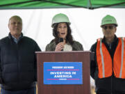 Rep. Marie Gluesenkamp Perez, D-Skamania, speaks to a crowd at Tidewater Barge Lines in Vancouver on Monday morning.