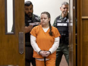 Misty Raya, a co-defendant in the 2021 fatal shooting of Clark County sheriffÄôs Sgt. Jeremy Brown, walks into the courtroom Friday, Sept. 29, 2023, at Clark County Courthouse. Raya pled guilty to second degree murder, two counts of second degree burglary, unlawful possession of a firearm and theft of a firearm.