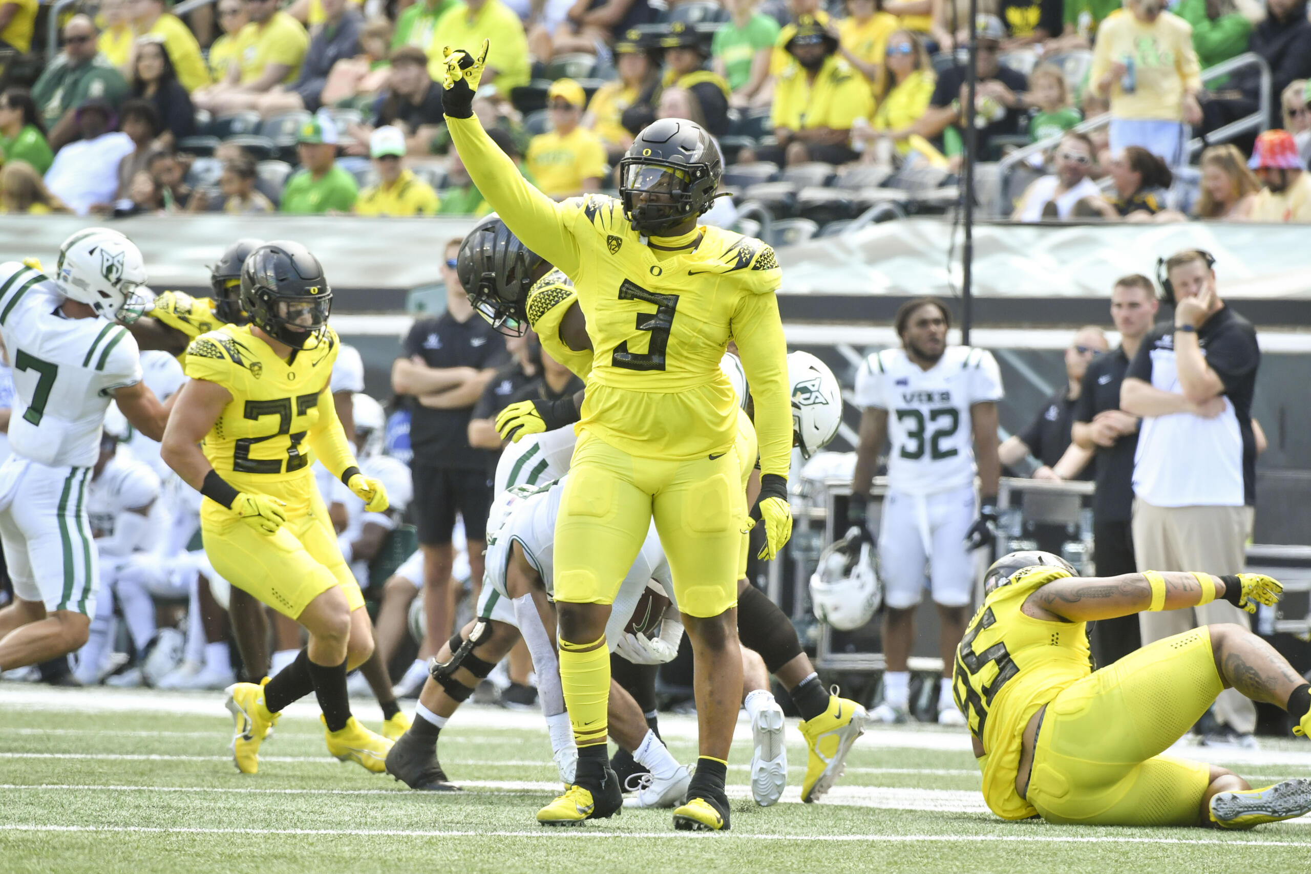 Oregon defensive end Brandon Dorlus (3) celebrates a stop against Portland State during the first half of an NCAA college football game Saturday, Sept. 2, 2023, in Eugene, Ore.