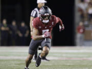 Washington State wide receiver Lincoln Victor runs a route during the second half of an NCAA college football game against Wisconsin, Saturday, Sept. 9, 2023, in Pullman, Wash.