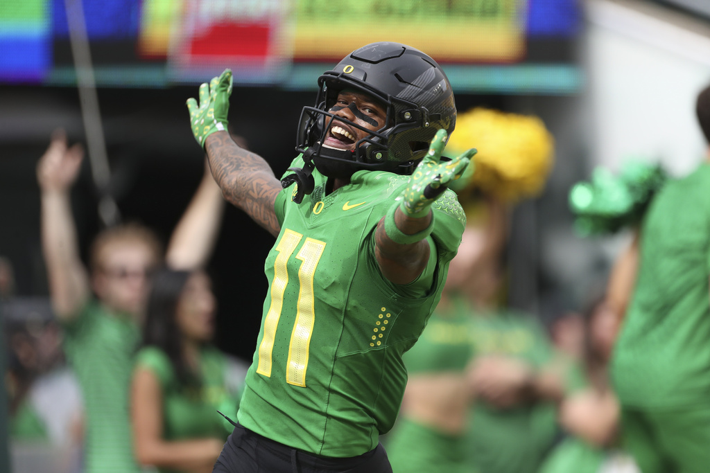 Oregon wide receiver Troy Franklin celebrates after scoring a touchdown against Colorado during the first half of an NCAA college football game, Saturday, Sept. 23, 2023, in Eugene, Ore.