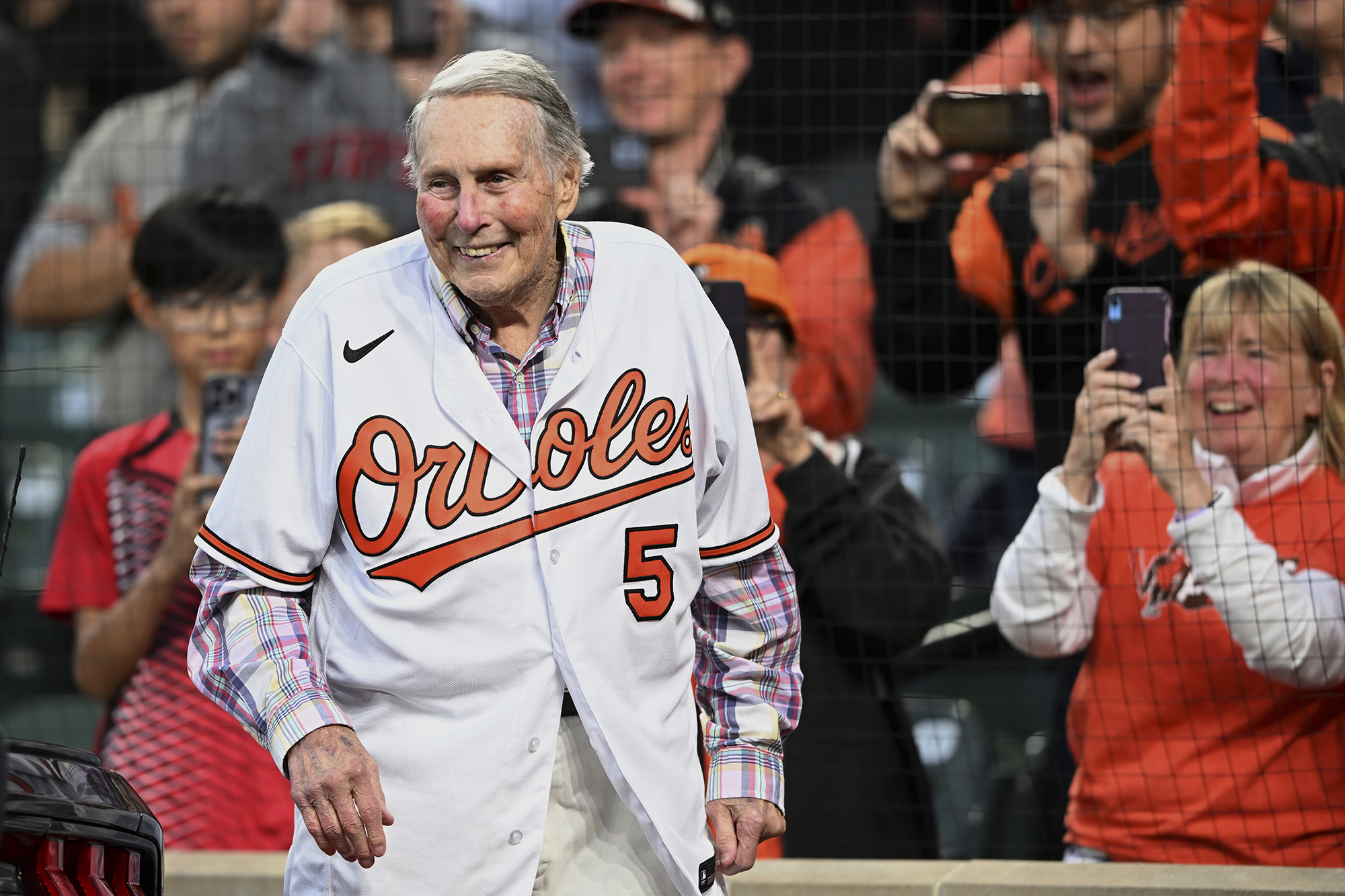 FILE - Former Baltimore Orioles third baseman Brooks Robinson is honored during a ceremony for the Hall of Fame before a baseball game between the Houston Astros and Baltimore Orioles, Sept. 24, 2022, in Baltimore. Robinson, whose deft glovework and folksy manner made him one of the most beloved and accomplished athletes in Baltimore history, has died, according to a joint announcement by the Orioles and his family Tuesday, Sept. 26, 2023.