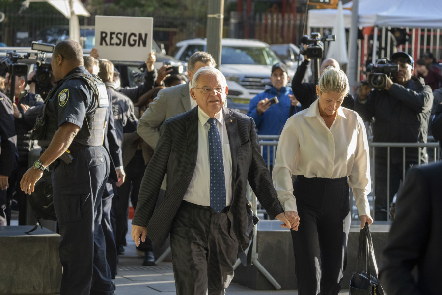 Democratic U.S. Sen. Bob Menendez of New Jersey and his wife Nadine Menendez arrive to the federal courthouse in New York, Wednesday, Sept. 27, 2023. Menendez is due in court to answer to federal charges alleging he used his powerful post to secretly advance Egyptian interests and carry out favors for local businessmen in exchange for bribes of cash and gold bars.